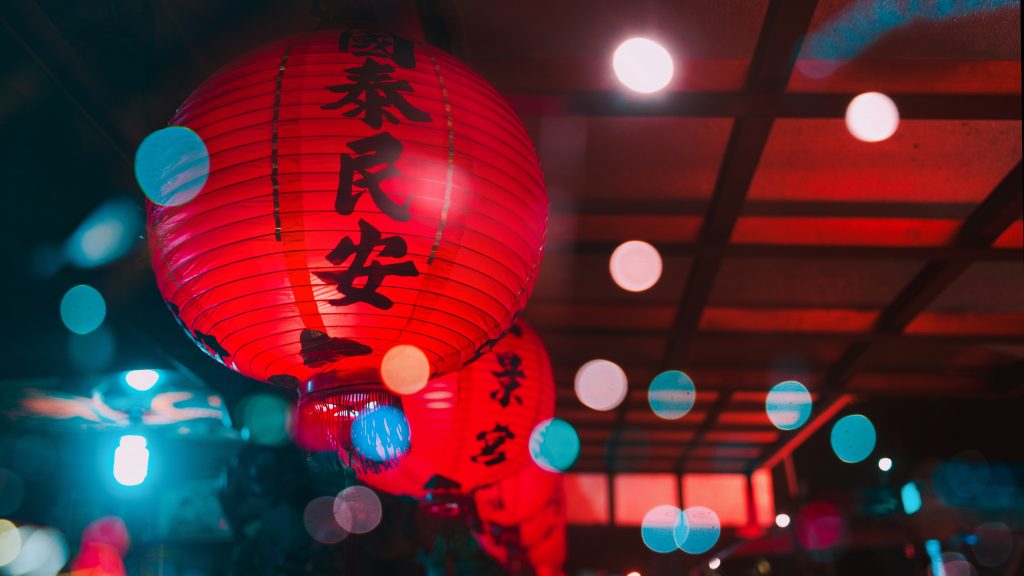 Red Chinese Lantern with letter peaceful country on it